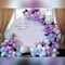 Фотозона с воздушными шарами на свадьбу с декоративной зеленью.